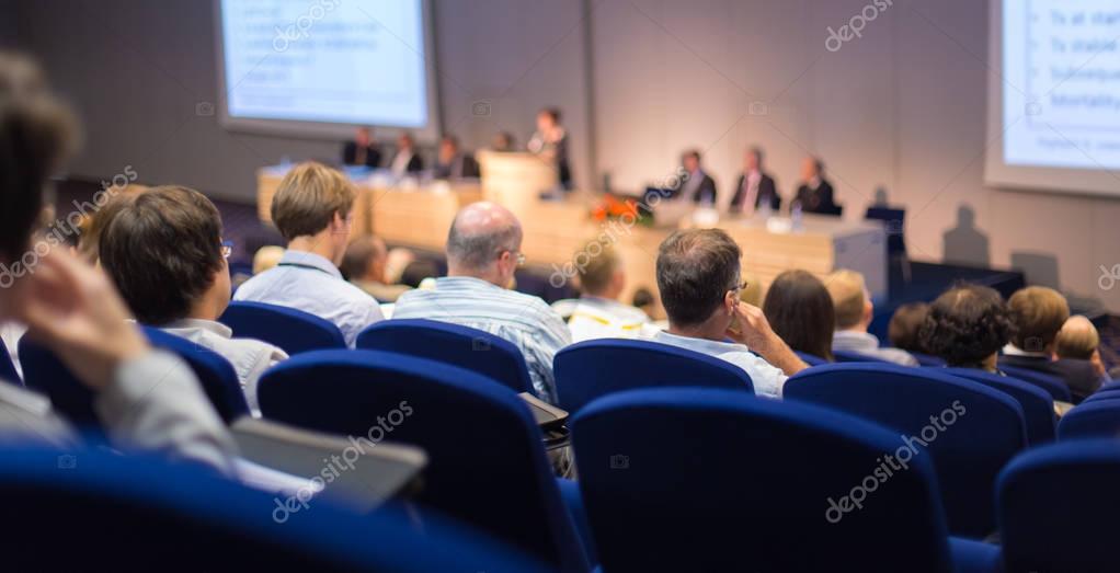 Scientific committee in discussion.