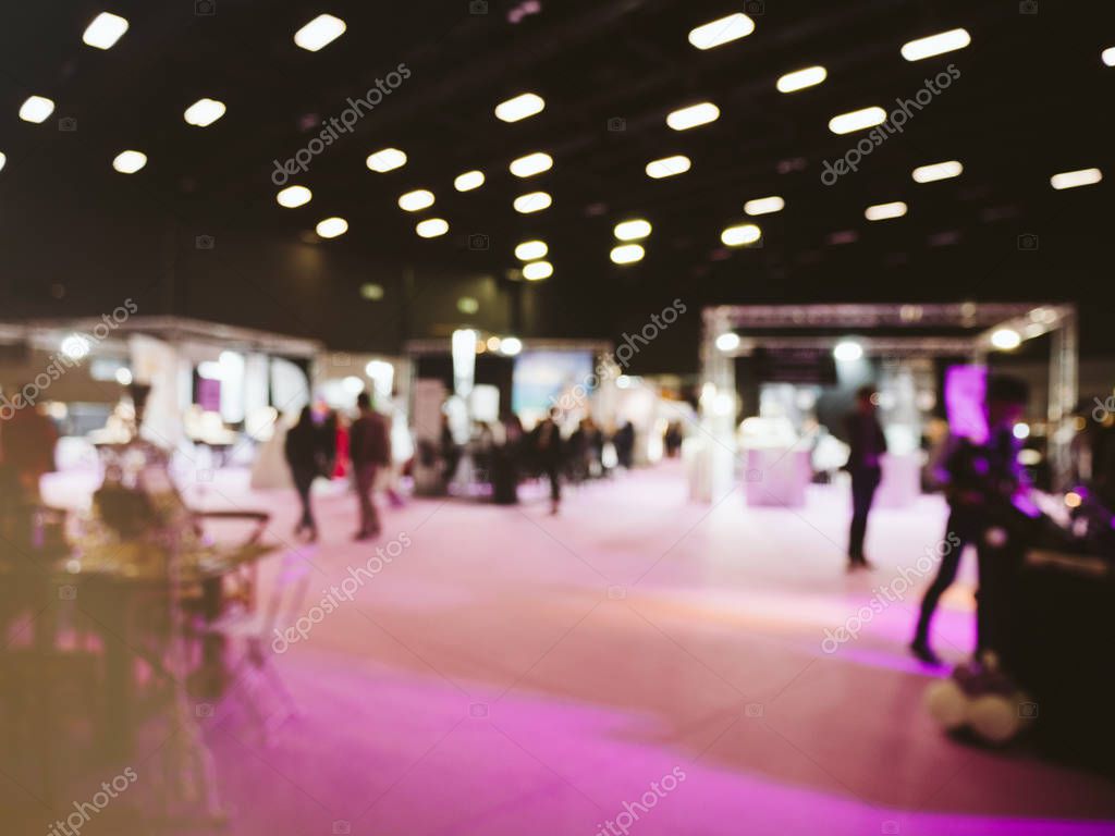 Exhibitors engaging with delegates.