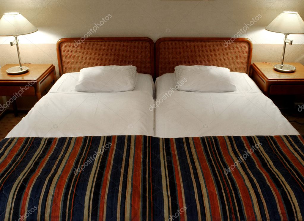 Budget hotel room near venue.